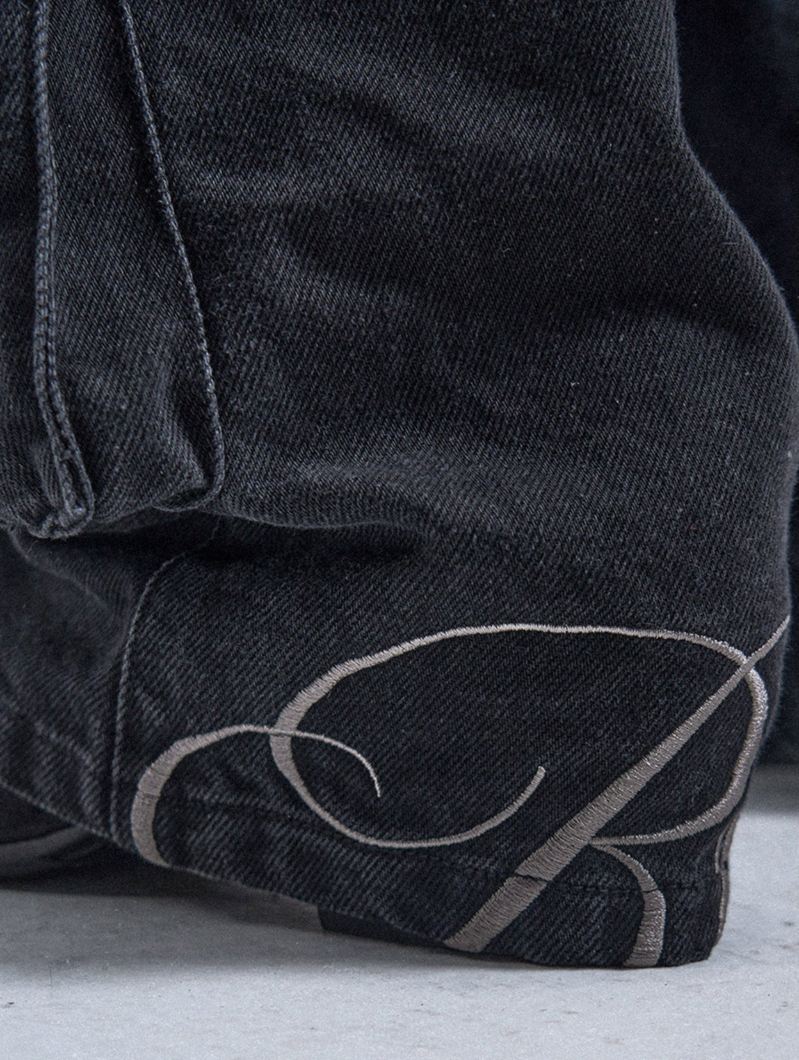 embroidered black distressed washed slim-fit bootcut denim overalls