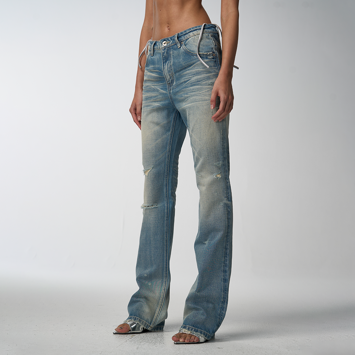 silverline low-rise distressed bootcut jeans