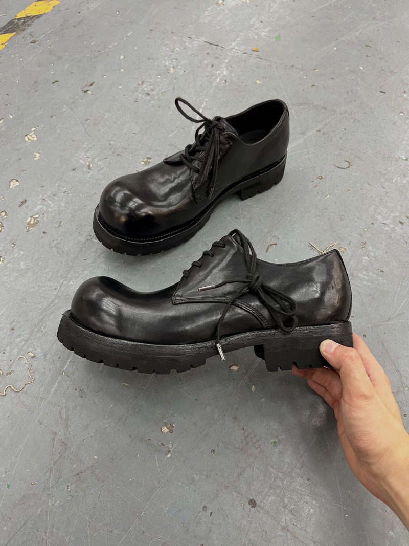 Hand-stitched horse skin Derby