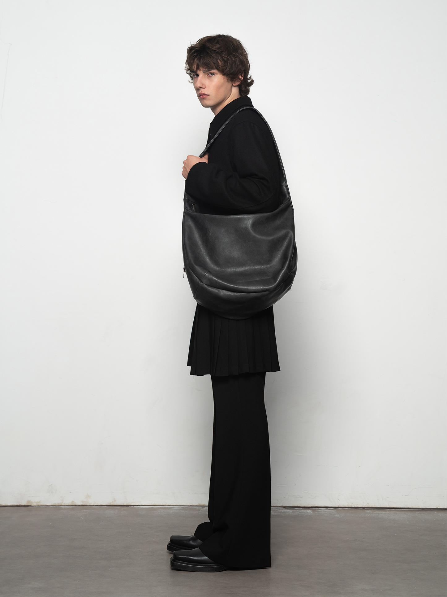 Peated leather stray bag